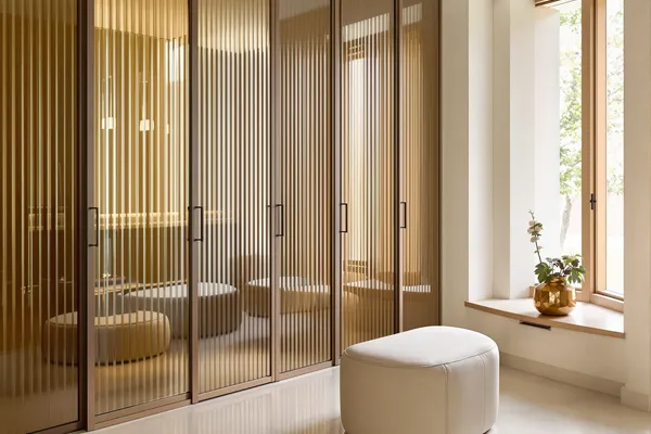 Bronze Fluted Dressing — glass interiors for a villa
